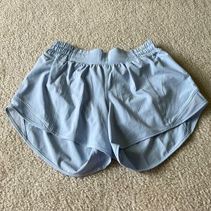 Lululemon Hotty Hot shorts low-rise 4 in. Color is Blue Linen